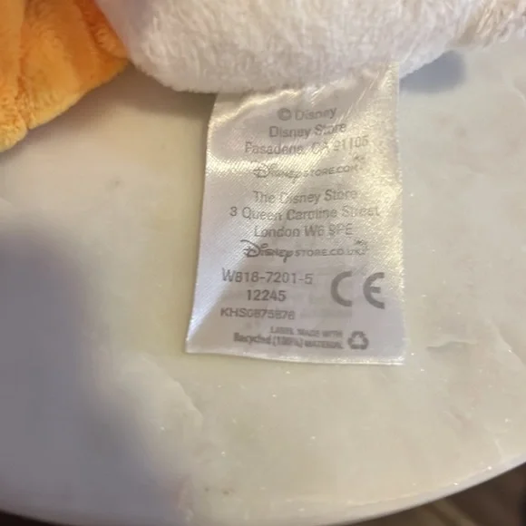 Disney Daisy Duck authentic original Disney Parks light purple & white & yellow​ - Picture 9 of 9